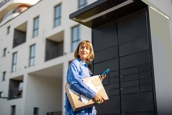 Woman picking up her mail including packages