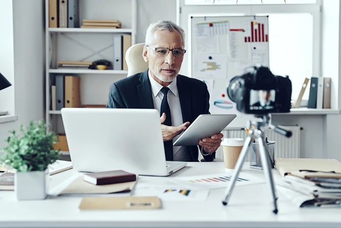 Photo of an accountant creating video content for an accounting firm.