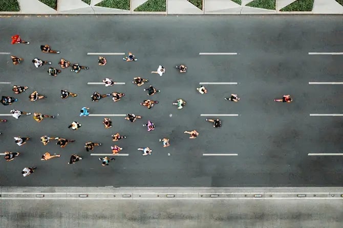 Aerial view of city runners.
