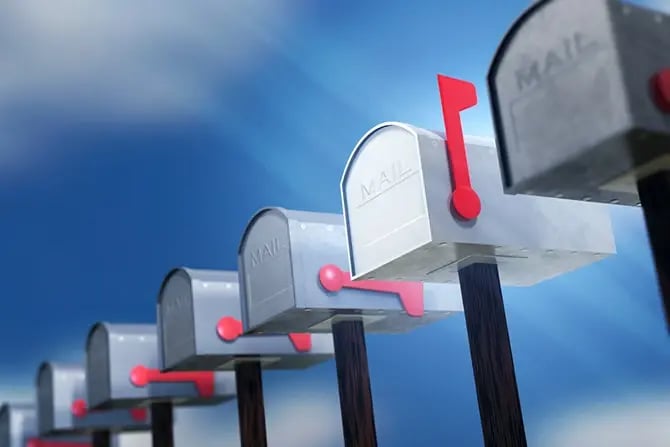 A row of mailboxes with one highlighted.