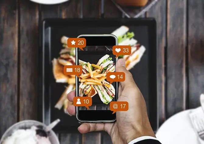 Close-up food photo on a mobile smartphone shared on social media with several notification icons